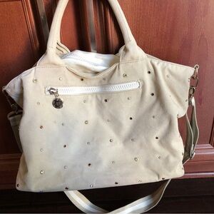 Thea Thea womens tan color baby diaper bag with golden hardware